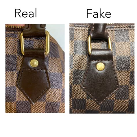 how to spot fake louis vuitton bag charms|authentic louis vuitton duffle bag.